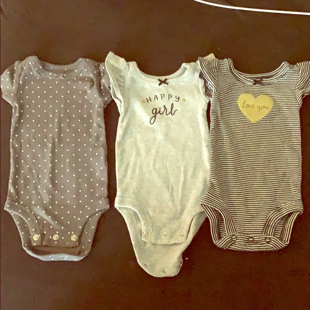 Carters newborn girl onesies.